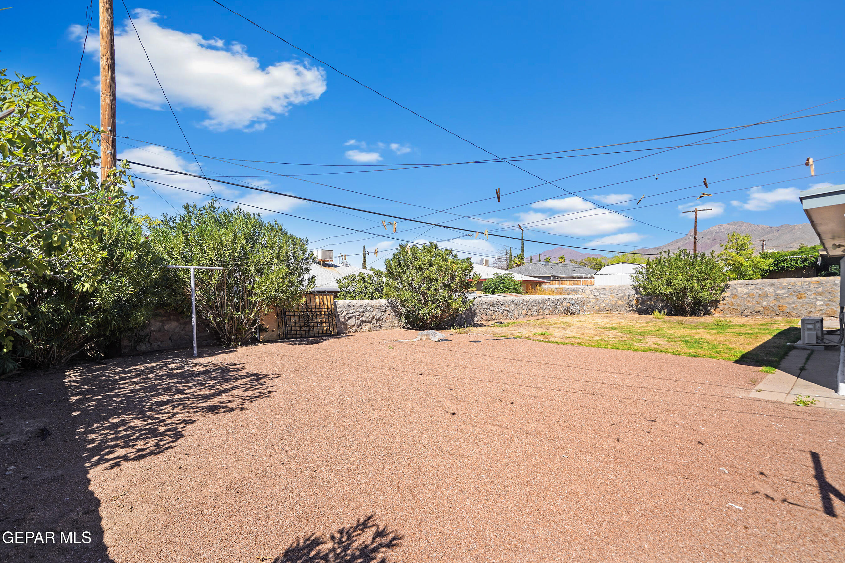 416 San Saba Road El Paso, TX 79912 - Photo 37 of 41 a view of a backyard of a house