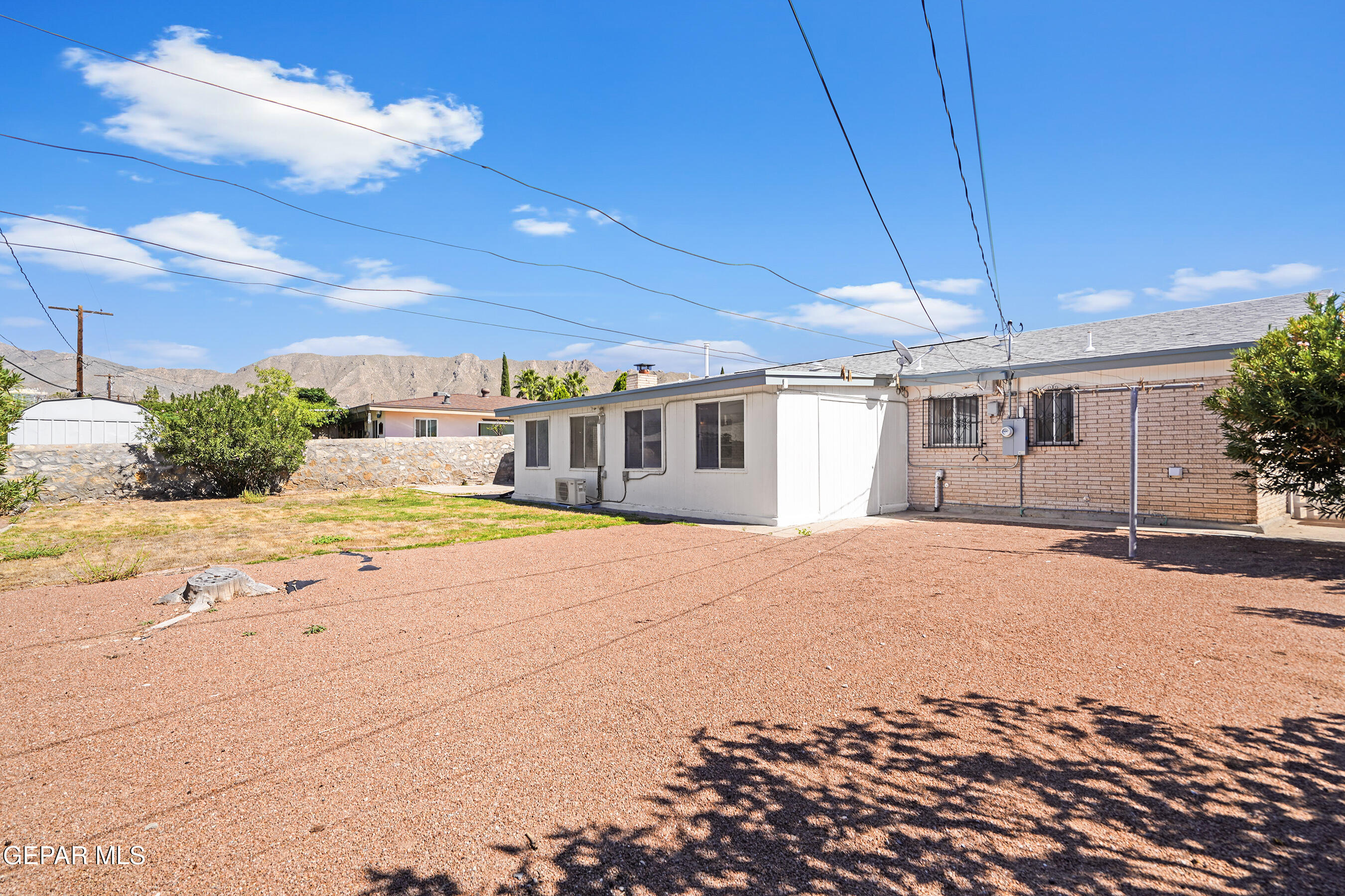 416 San Saba Road El Paso, TX 79912 - Photo 38 of 41 a view of a house with a snow in the yard