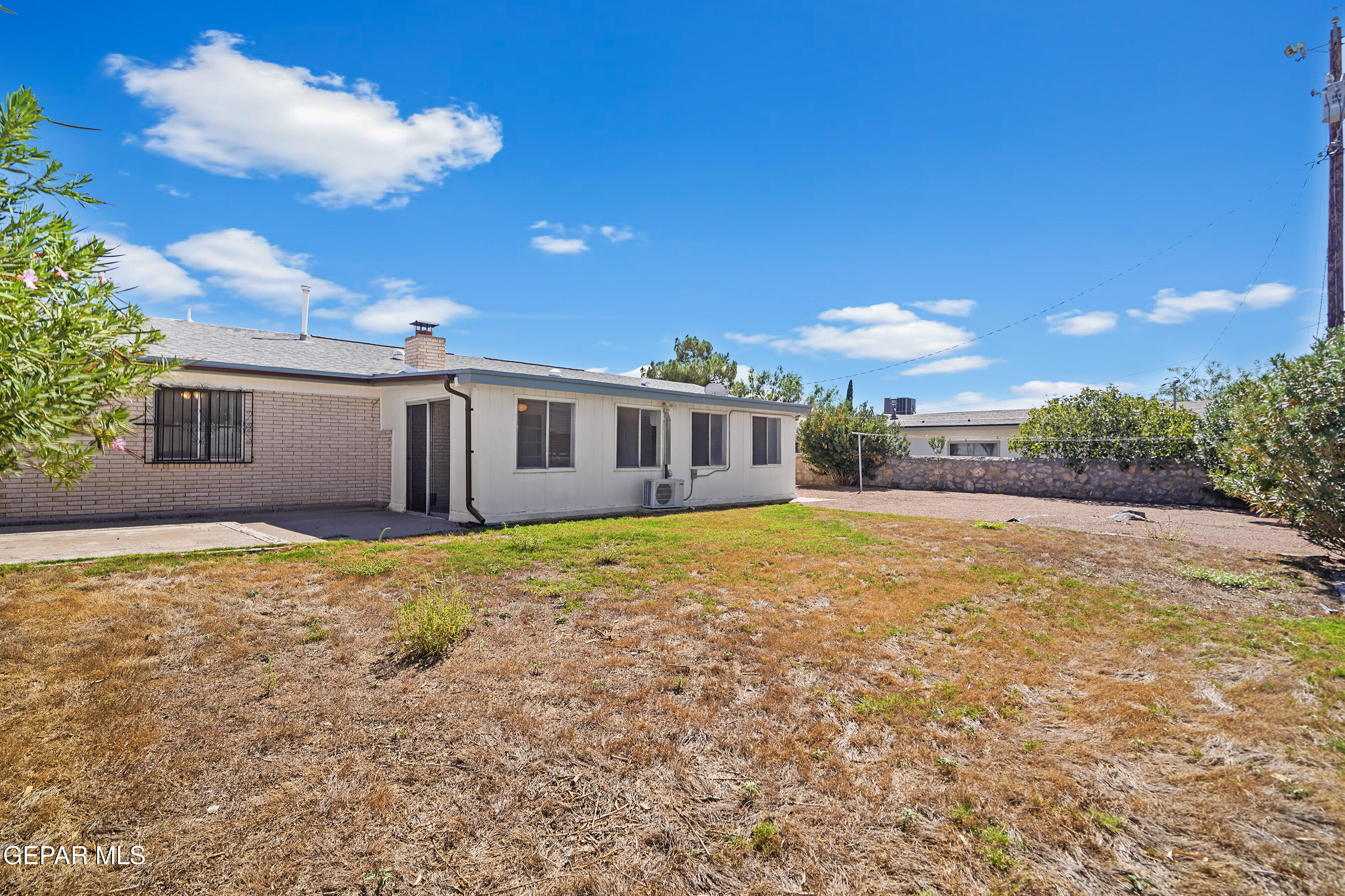 416 San Saba Road El Paso, TX 79912 - Photo 39 of 41 a view of a house with a yard