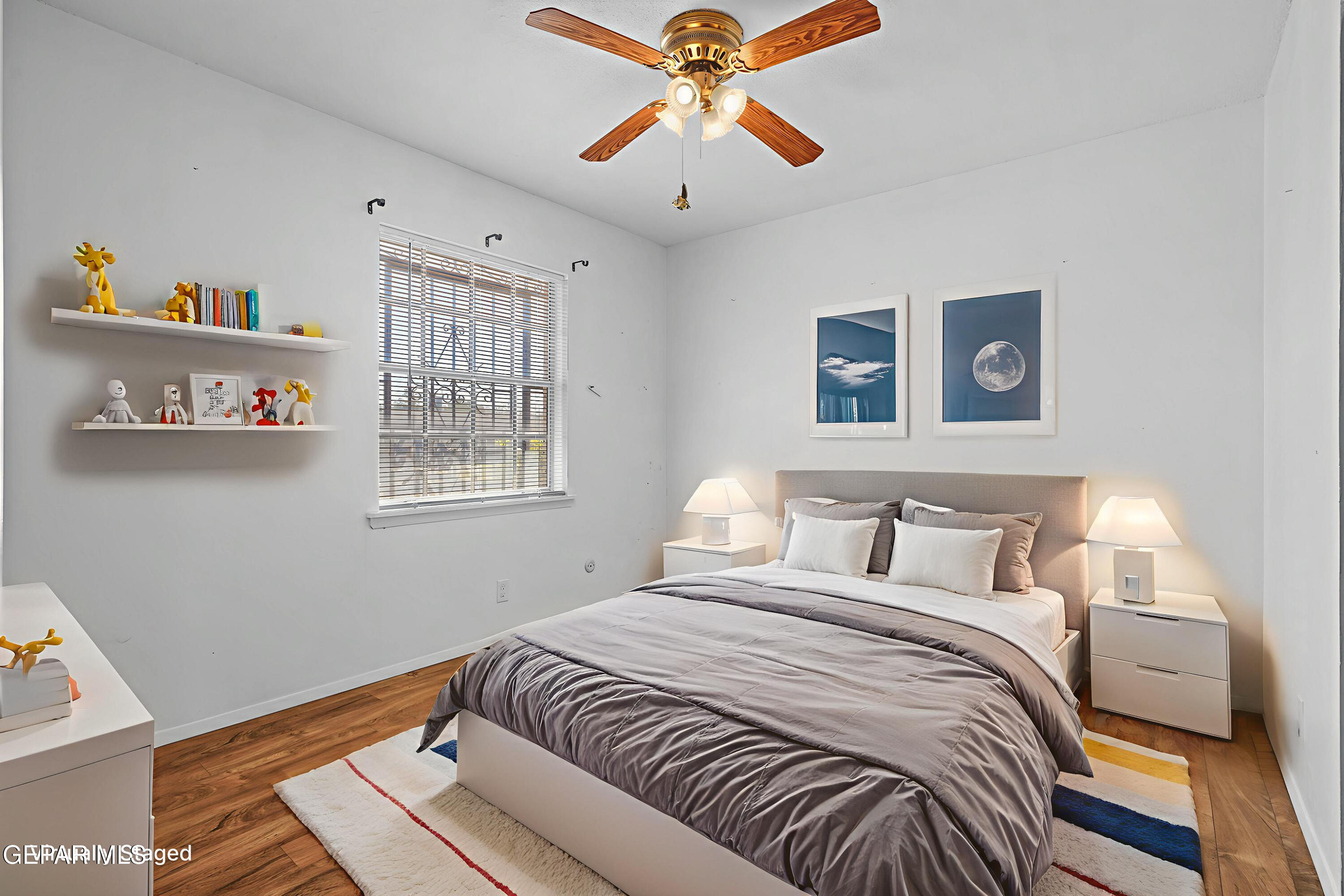 416 San Saba Road El Paso, TX 79912 - Photo 9 of 41 a bedroom with a bed and a window