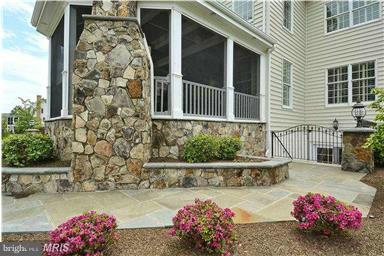 4468 Corral Road Warrenton, VA 20187 - Photo 10 of 30 Screened porch w stone fireplace