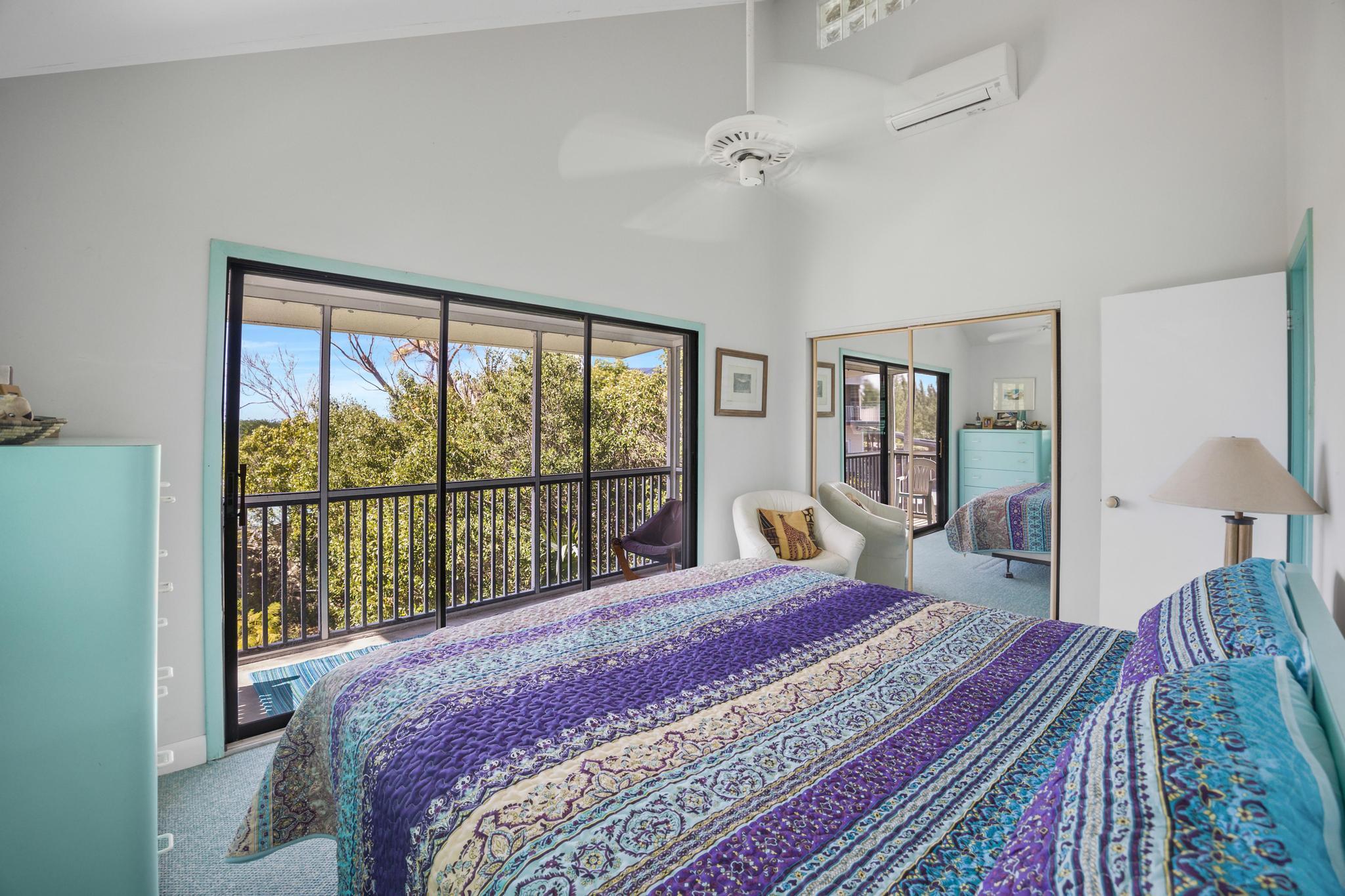 2148 Bahia Shores Road Big Pine Key, FL 33043 - Photo 13 of 35 a bedroom with a large bed and a large window