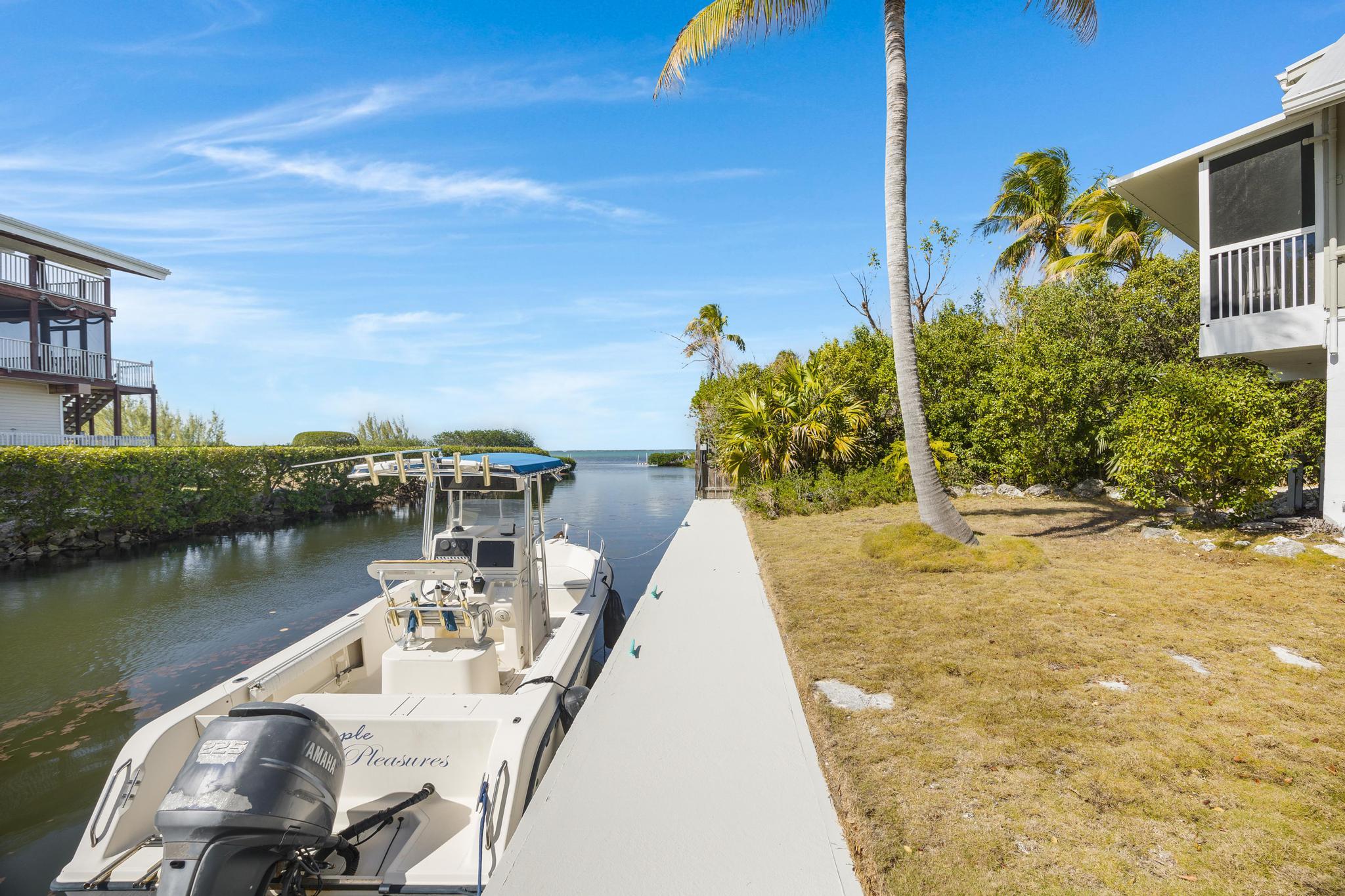 2148 Bahia Shores Road Big Pine Key, FL 33043 - Photo 2 of 35 a view of a swimming pool with a patio