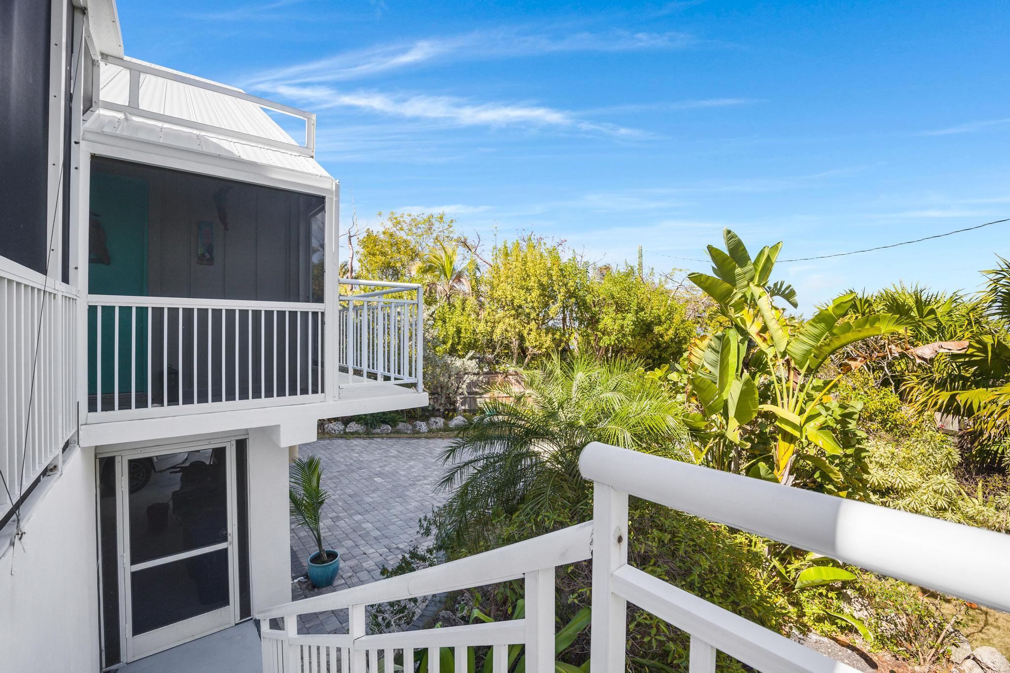 2148 Bahia Shores Road Big Pine Key, FL 33043 - Photo 21 of 35 a view of a porch with a yard