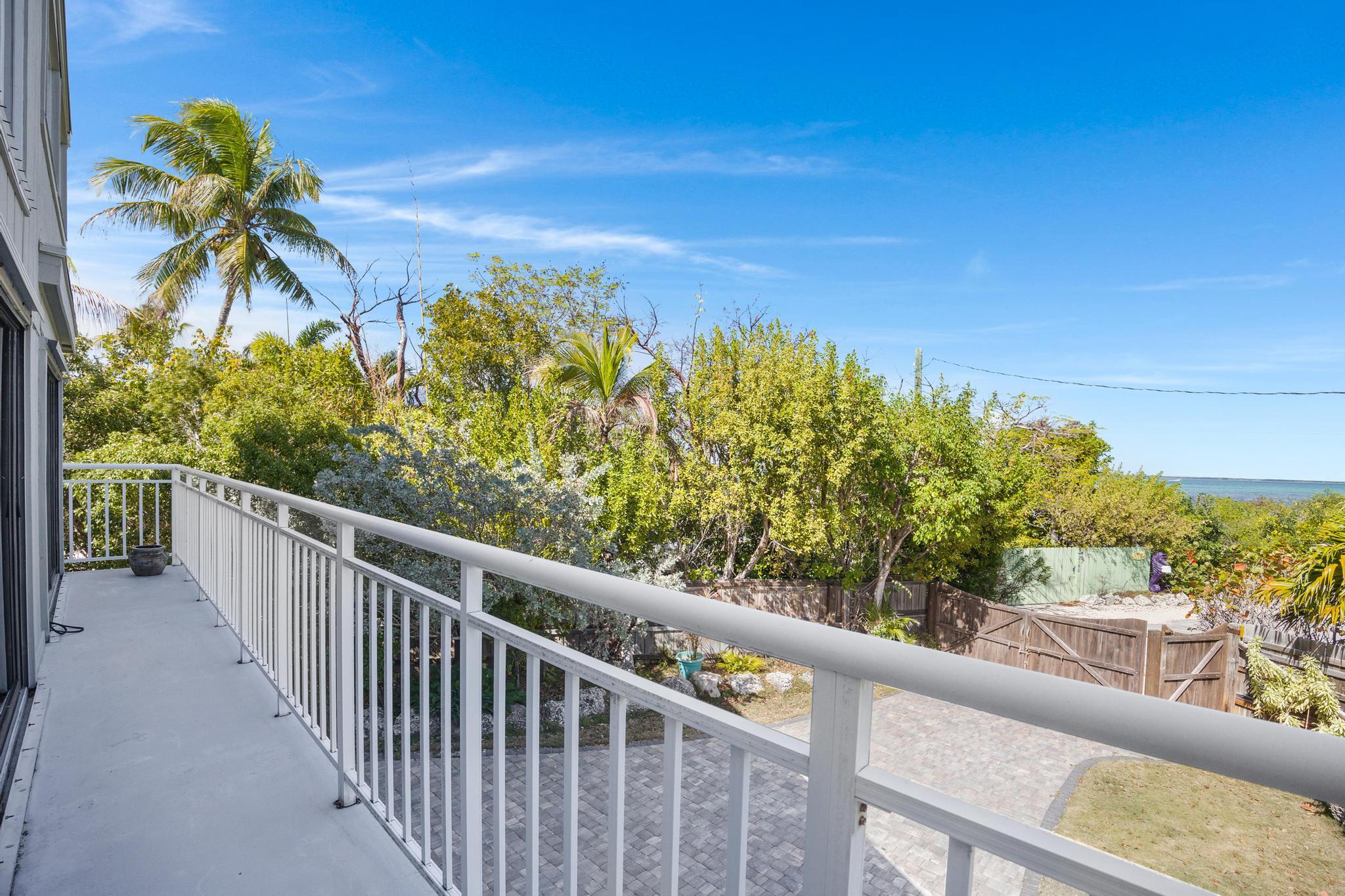 2148 Bahia Shores Road Big Pine Key, FL 33043 - Photo 23 of 35 a view of a balcony with wooden fence