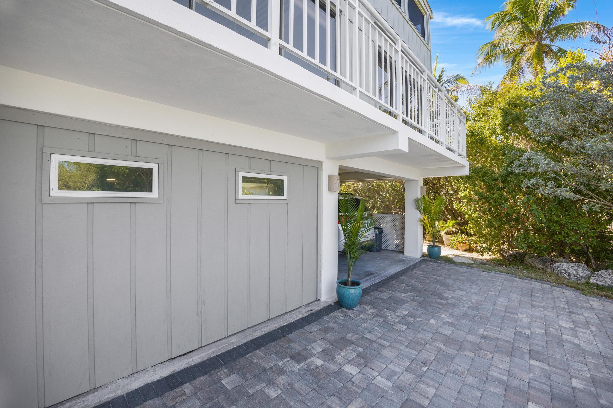 2148 Bahia Shores Road Big Pine Key, FL 33043 - Photo 24 of 35 a view of a porch with a yard
