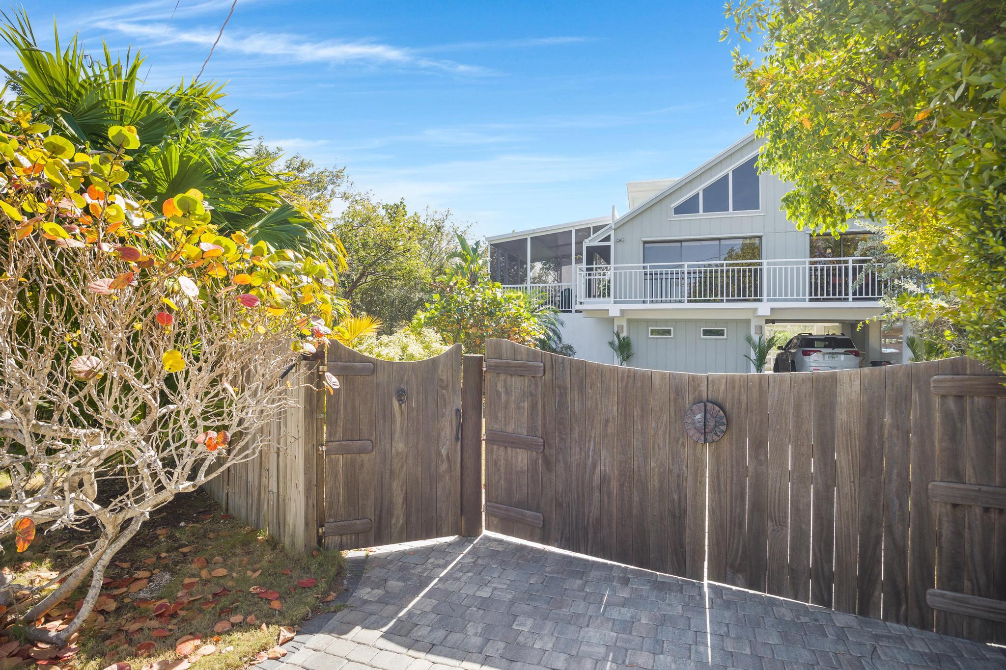2148 Bahia Shores Road Big Pine Key, FL 33043 - Photo 26 of 35 a front view of a house with a yard