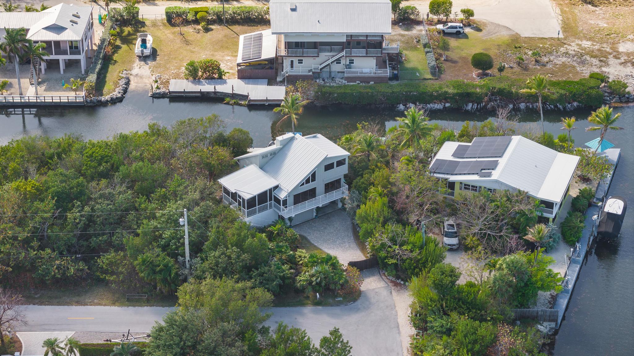 2148 Bahia Shores Road Big Pine Key, FL 33043 - Photo 32 of 35 an aerial view of a house with a lake view