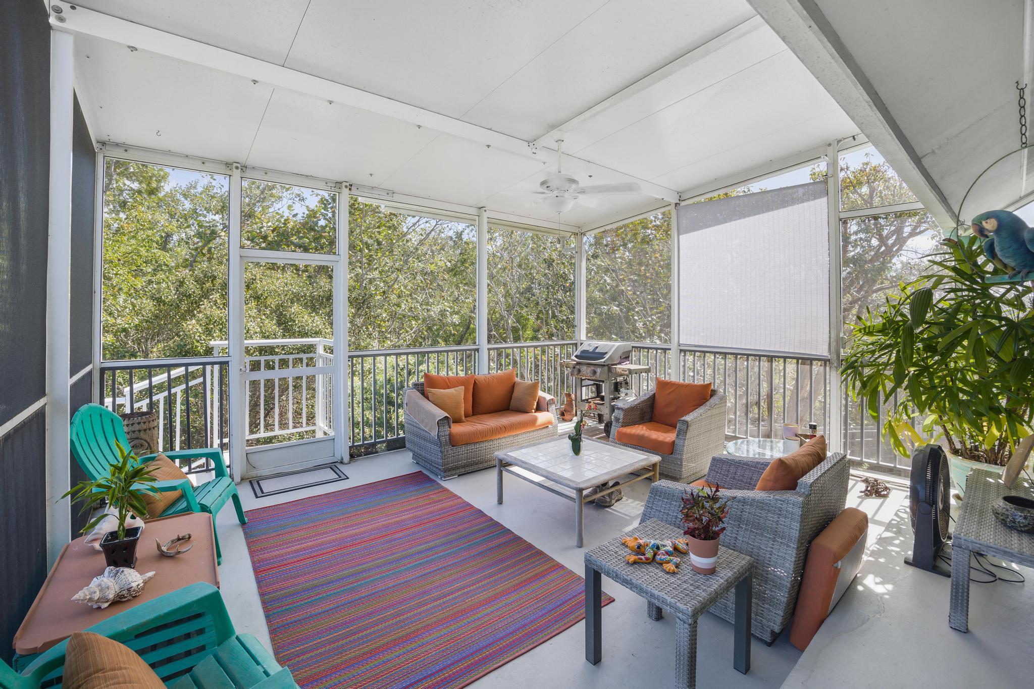 2148 Bahia Shores Road Big Pine Key, FL 33043 - Photo 5 of 35 a outdoor living space with furniture and garden view