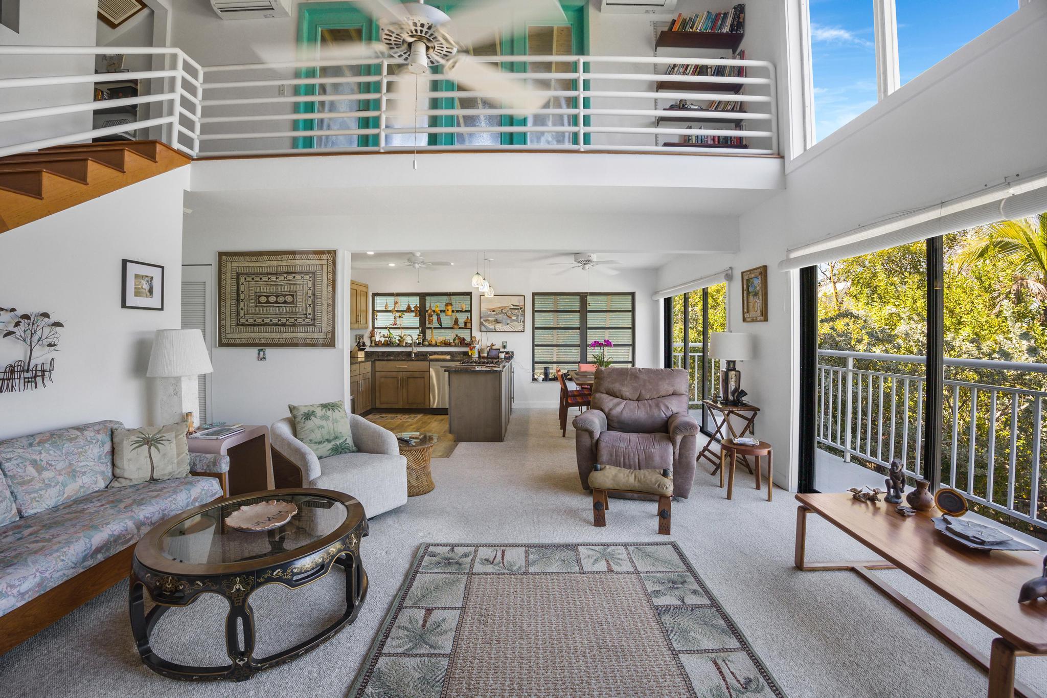 2148 Bahia Shores Road Big Pine Key, FL 33043 - Photo 35 of 35 a living room with furniture and a floor to ceiling window
