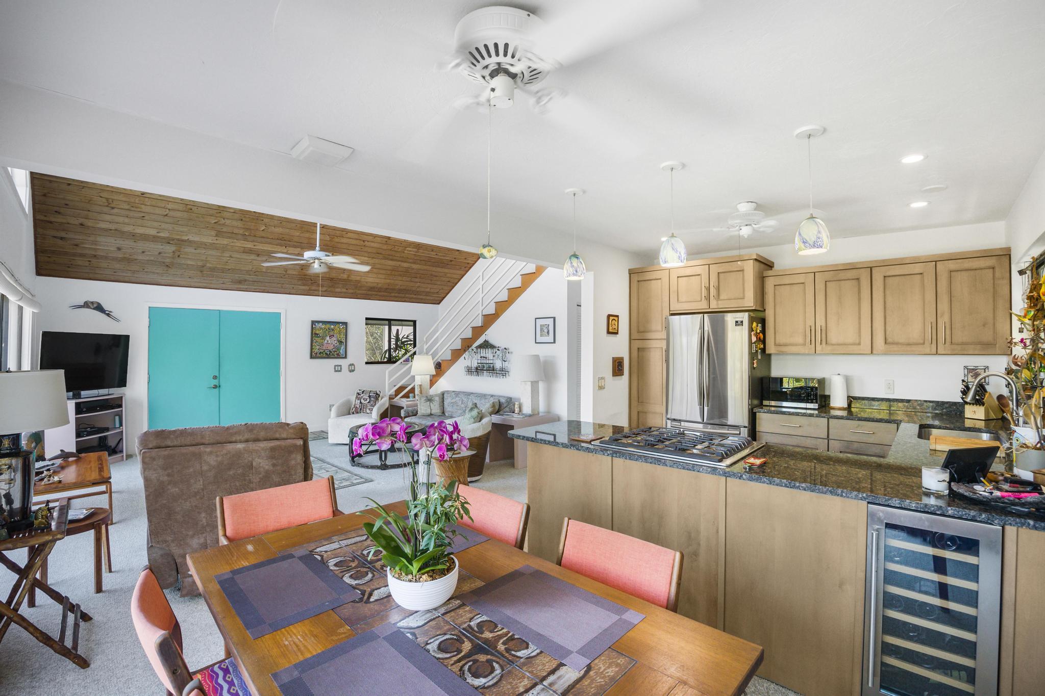 2148 Bahia Shores Road Big Pine Key, FL 33043 - Photo 8 of 35 a living room with furniture flowerpot and a chandelier