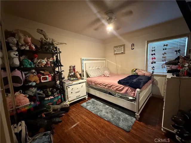 a bedroom with a bed and furniture