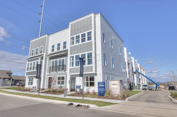 a front view of a building with street view