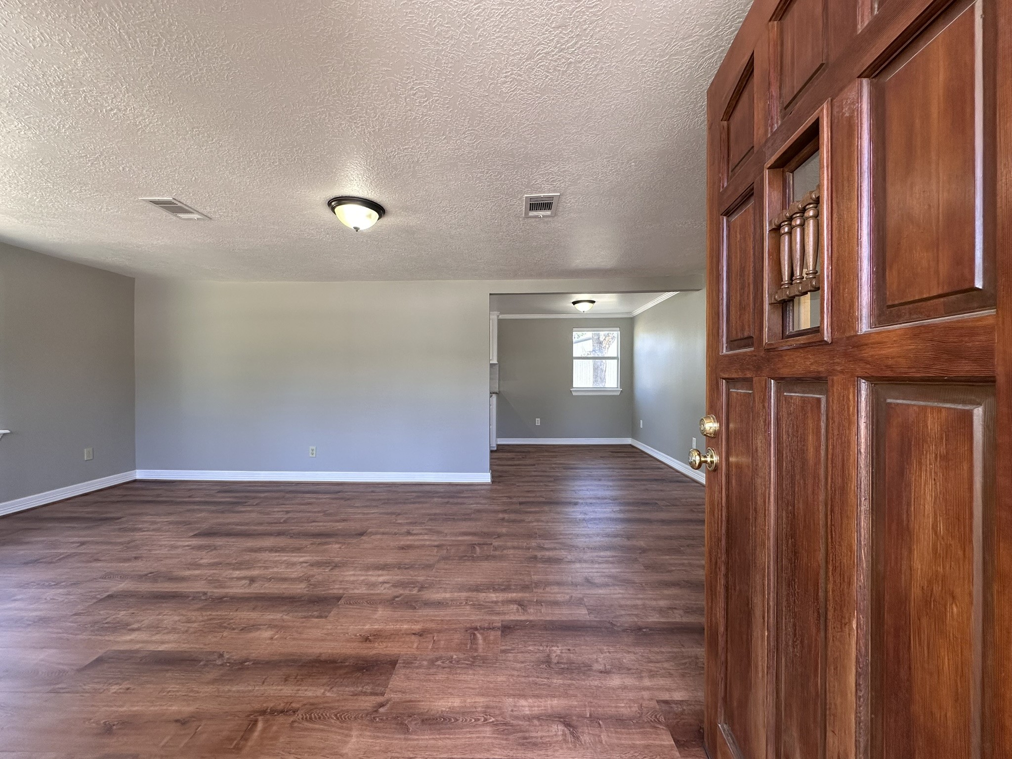 13868 Cedar Hill Road Montgomery, TX 77356 - Photo 3 of 19 a view of an entryway with wooden floor