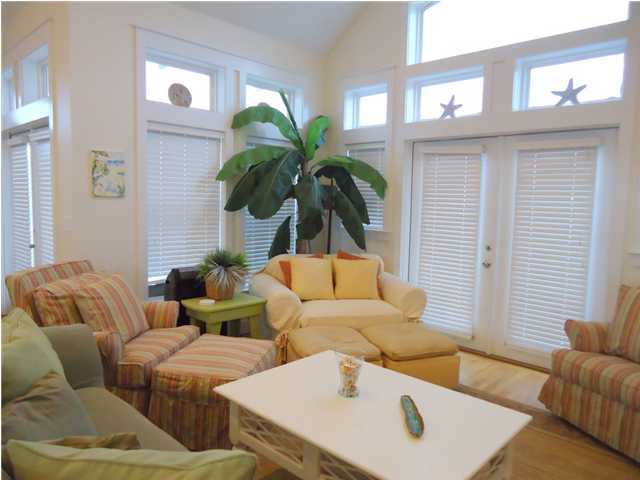 95 Don Bishop Road Santa Rosa Beach, FL 32459 - Photo 23 of 32 a living room with furniture and a potted plant