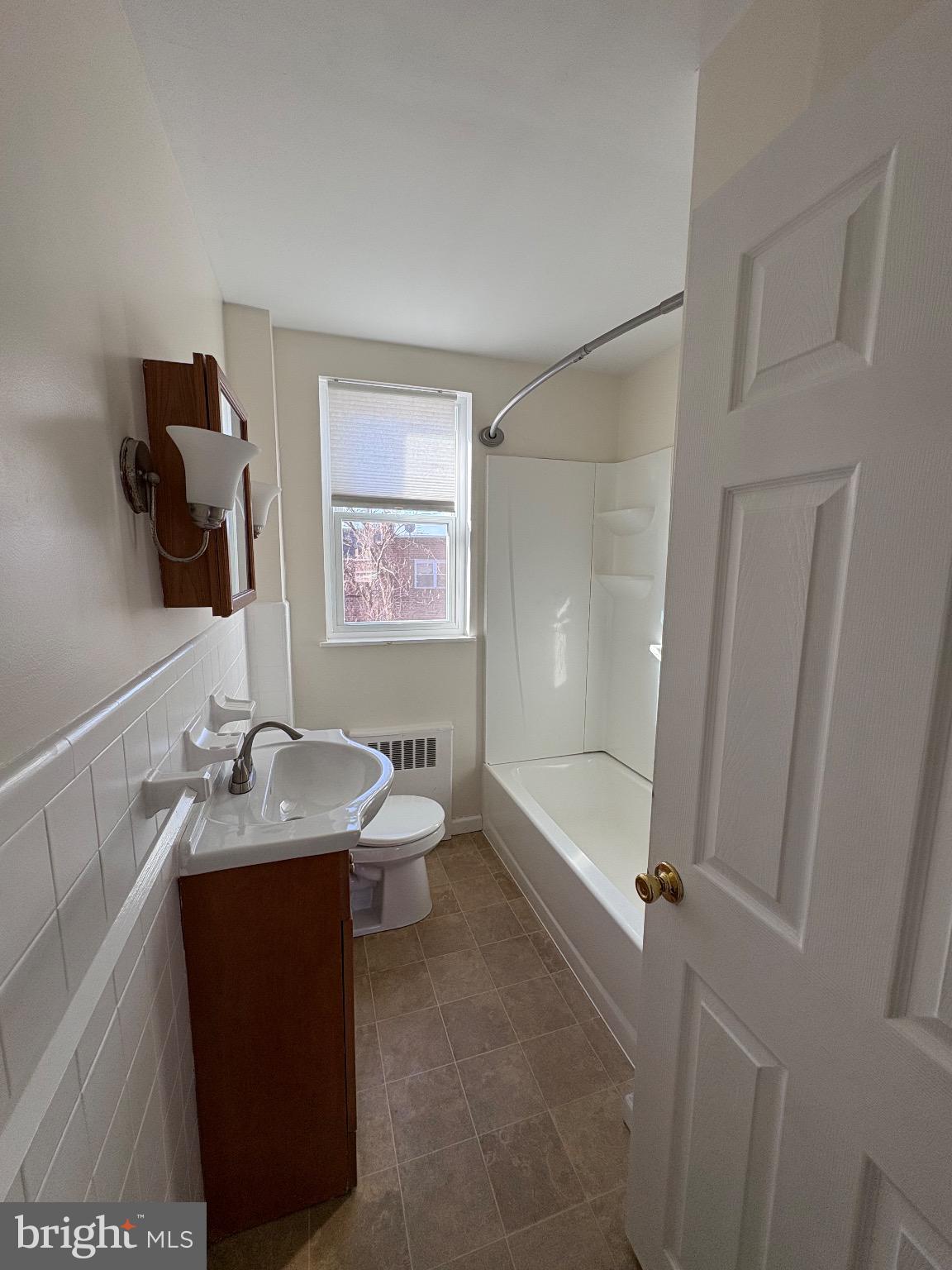 830 Emerson Street, Unit 2 Philadelphia, PA 19111 - Photo 6 of 10 Bright and airy bathroom with modern fixtures.