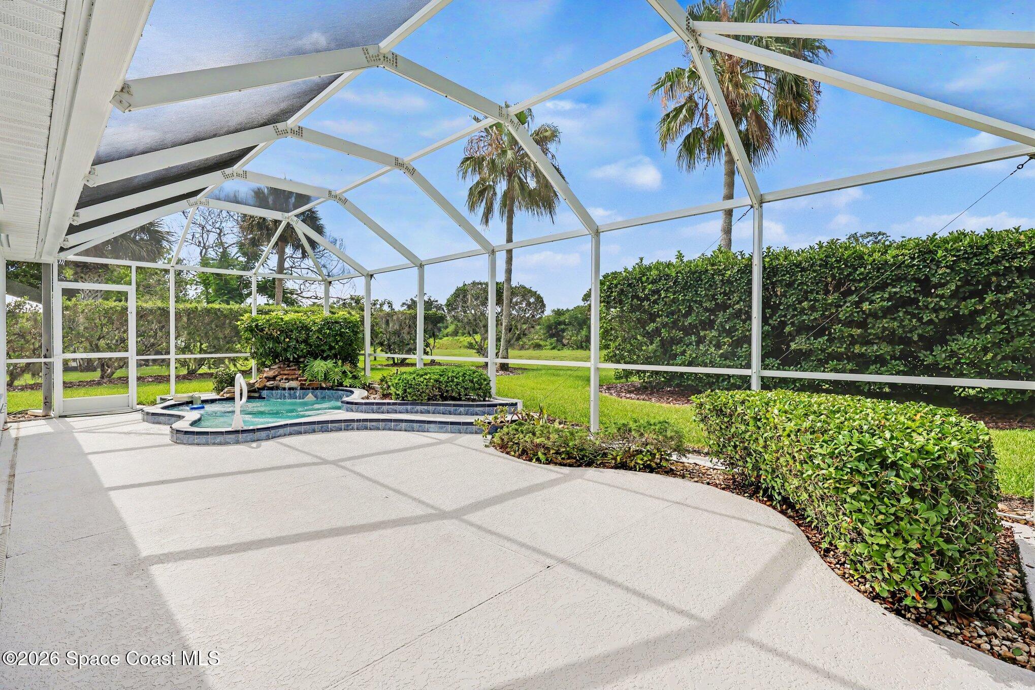 1230 Meadowbrook Road Northeast Palm Bay, FL 32905 - Photo 25 of 43 View of Back Patio