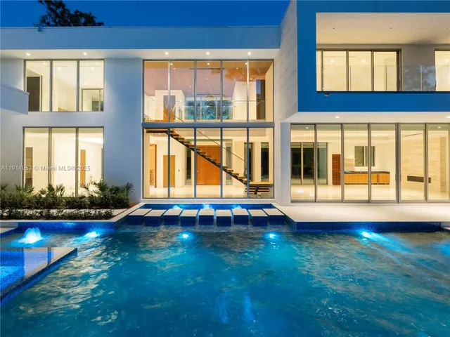 a view of swimming pool with an outdoor space and seating area