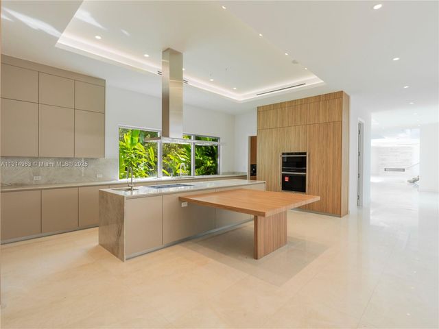 a bathroom with a bathtub and a sink
