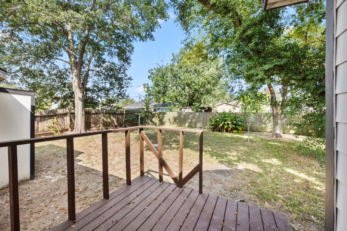 905 Elm Avenue Pasadena, TX 77506 - Photo 18 of 21 a view of outdoor space with deck and trees