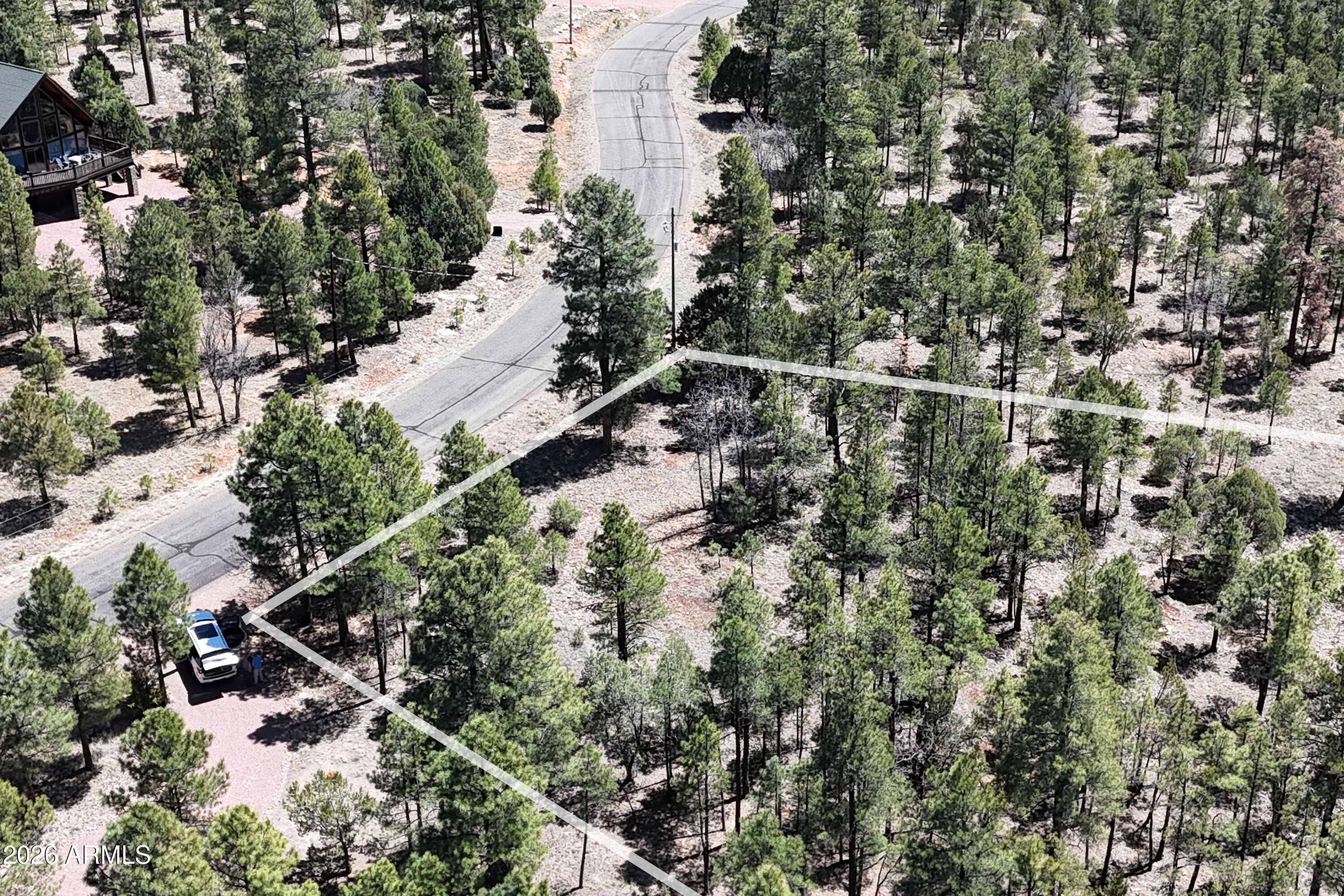 2870 Coyote Ridge, Unit 54 Happy Jack, AZ 86024 - Photo 7 of 37 a view of a city
