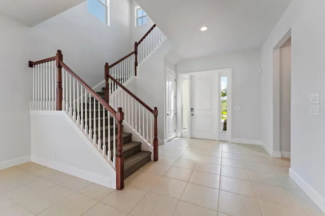 a kitchen with stainless steel appliances granite countertop a stove and a refrigerator