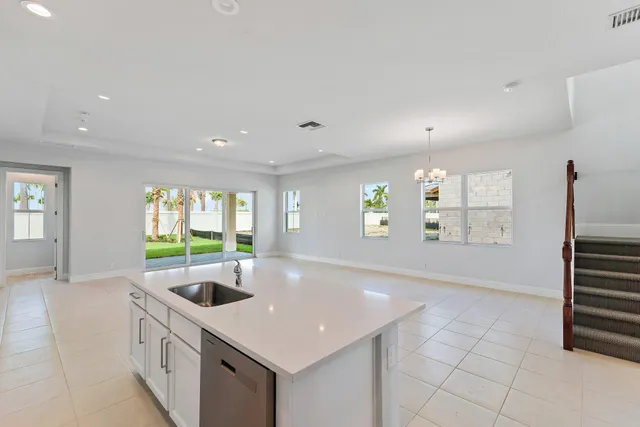 a view of a hallway with seating area