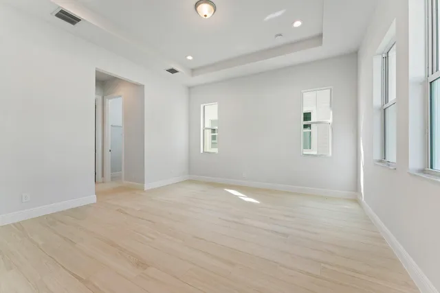 an empty room with windows