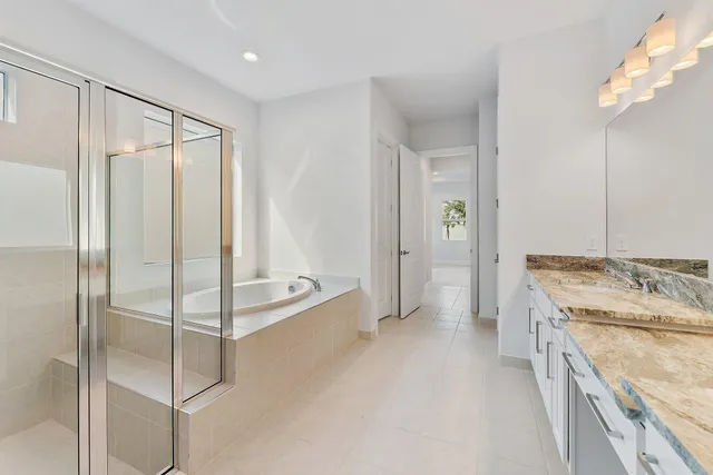 an empty room with a empty space and windows