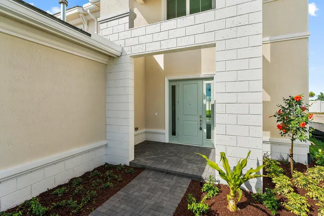 a view of a bathroom with a glass door shower