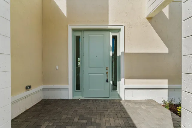 a view of a patio with a yard