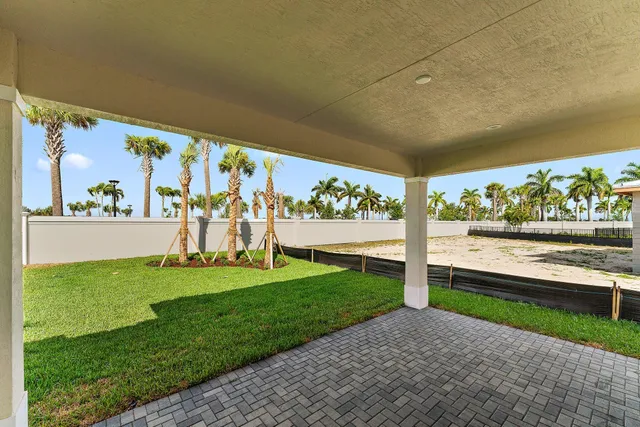 a view of a yard in front of a house