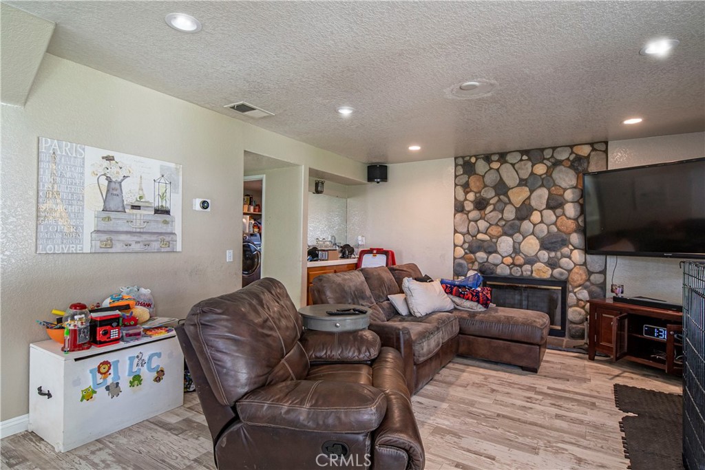 1491 Hunters Trail Glendora, CA 91740 - Photo 15 of 54 a living room with furniture and a flat screen tv