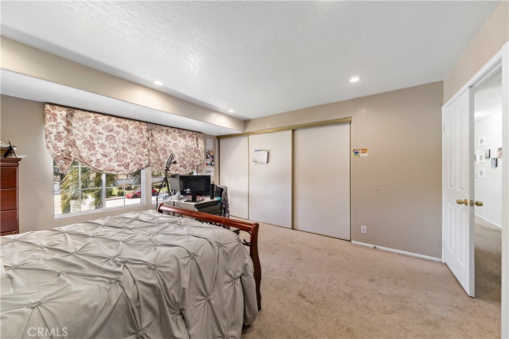 1491 Hunters Trail Glendora, CA 91740 - Photo 24 of 54 a bed room with a bed and a large window