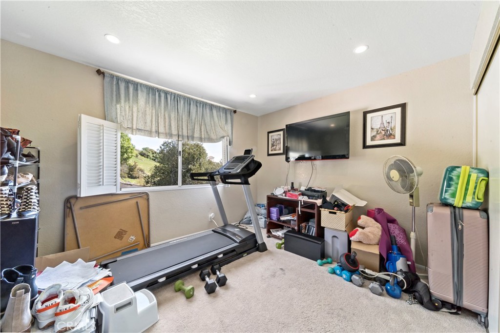 1491 Hunters Trail Glendora, CA 91740 - Photo 29 of 54 a room with gym equipment and a window
