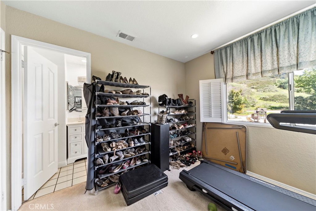 1491 Hunters Trail Glendora, CA 91740 - Photo 30 of 54 a view of a room with gym equipment