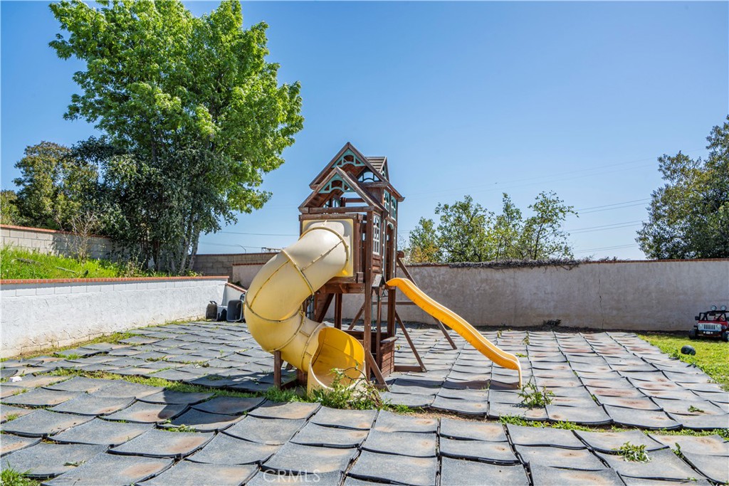 1491 Hunters Trail Glendora, CA 91740 - Photo 39 of 54 a view of a swimming pool with a patio