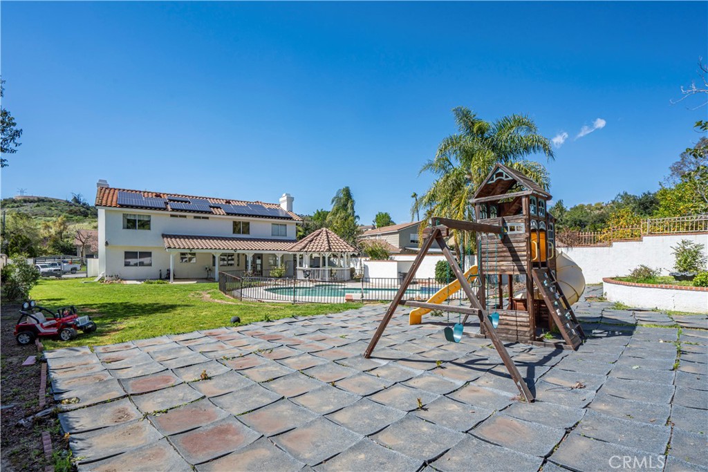 1491 Hunters Trail Glendora, CA 91740 - Photo 41 of 54 a view of a house with backyard water fountain and sitting area
