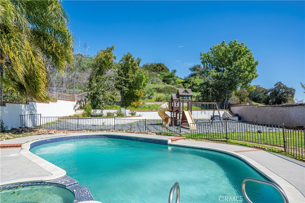 1491 Hunters Trail Glendora, CA 91740 - Photo 43 of 54 a view of a swimming pool with a patio