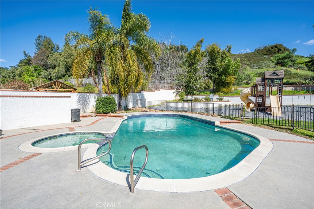 1491 Hunters Trail Glendora, CA 91740 - Photo 44 of 54 a view of a swimming pool with a patio