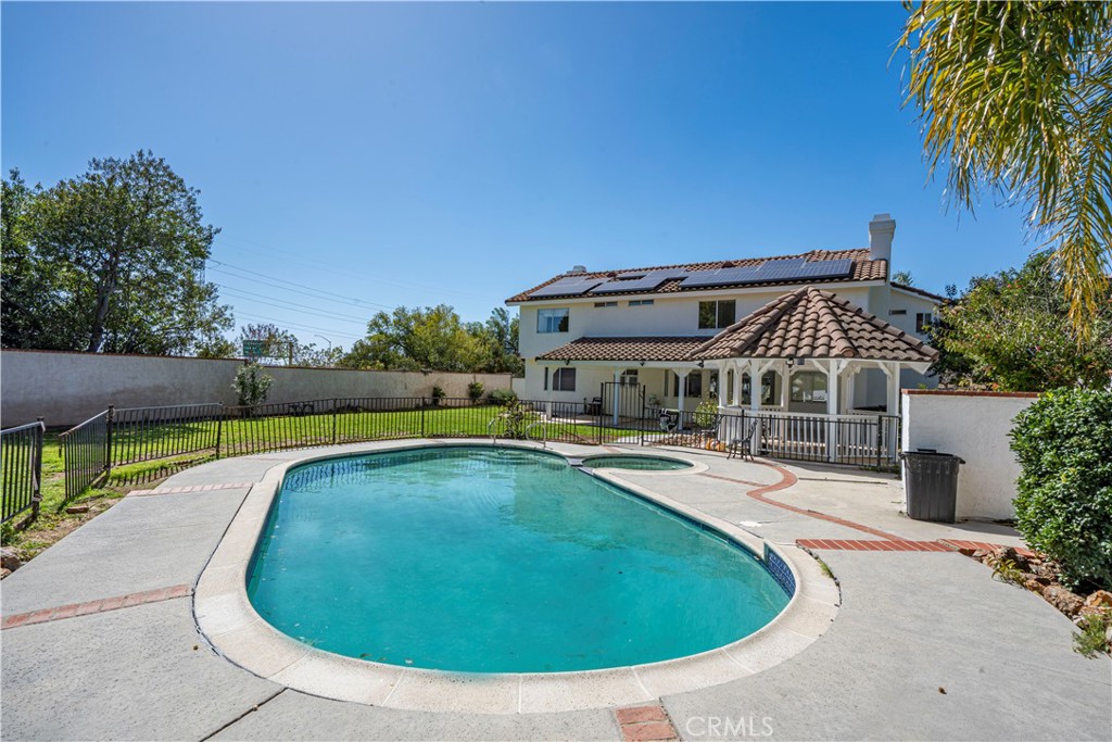 1491 Hunters Trail Glendora, CA 91740 - Photo 45 of 54 a view of a swimming pool with a yard
