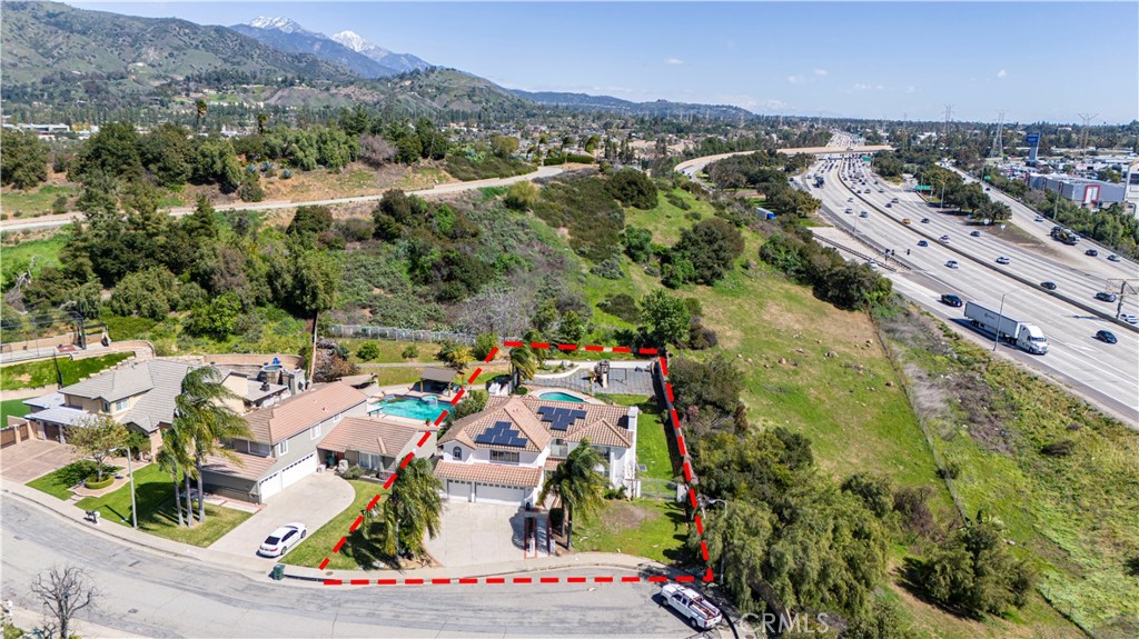 1491 Hunters Trail Glendora, CA 91740 - Photo 49 of 54 an aerial view of residential houses with outdoor space and trees