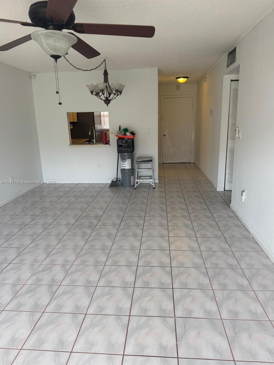 Lauderhill Lauderhill, FL 33313 - Photo 5 of 14 a view of a livingroom with furniture and a ceiling fan