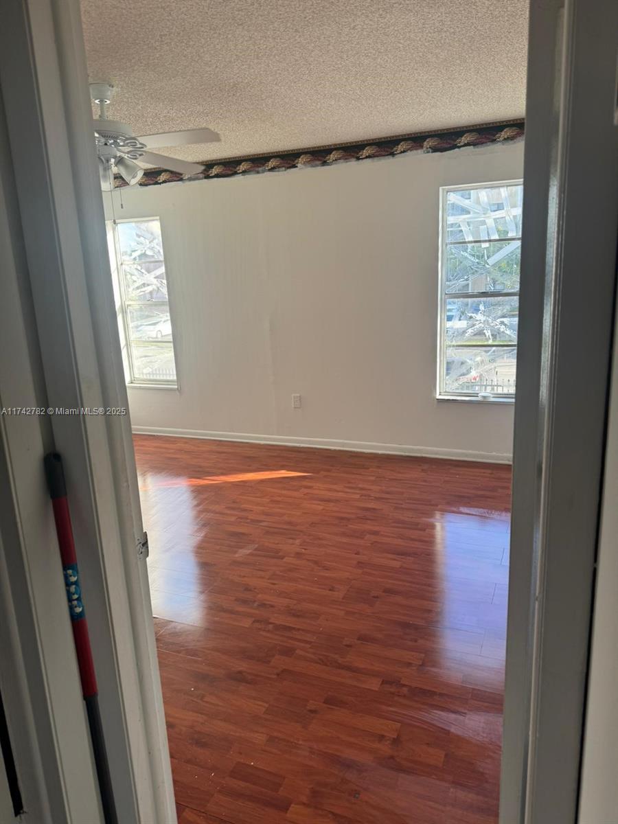 Lauderhill Lauderhill, FL 33313 - Photo 8 of 14 a view of walk in closet with empty racks