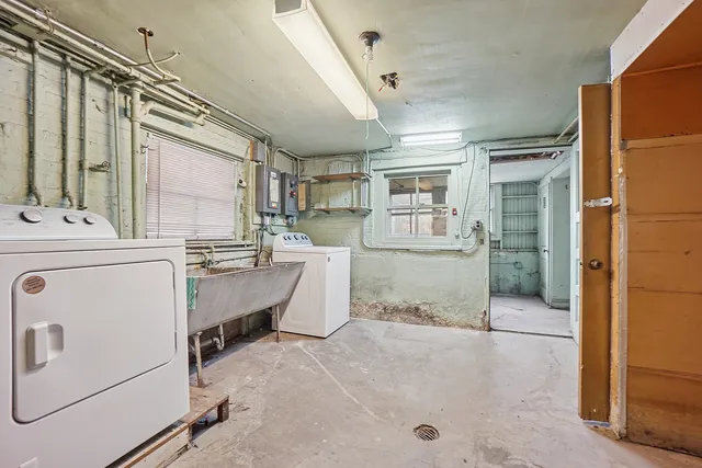 a room with a washing machine and dryer