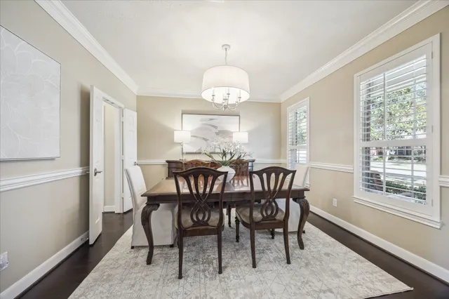 a spacious bathroom with a granite countertop sink and a mirror