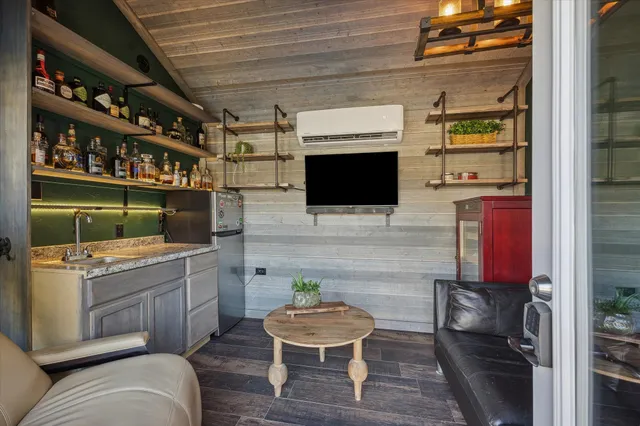 a workspace with furniture and a window