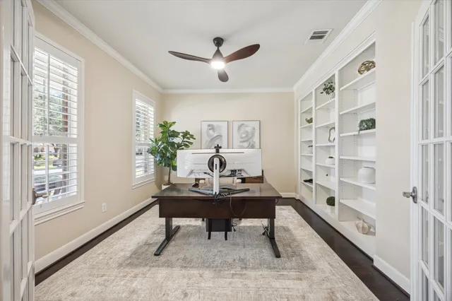 a view of entryway with wooden floor and stairs