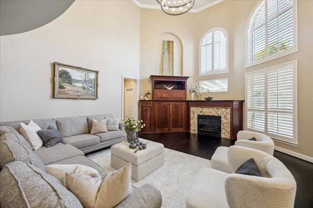 a view of a backyard with swimming pool