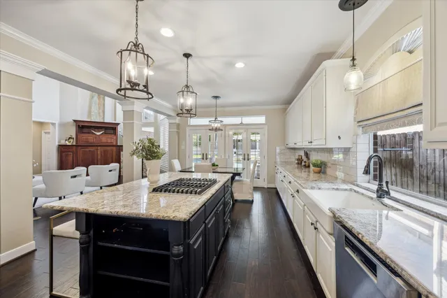 a view of a house with swimming pool and sitting area